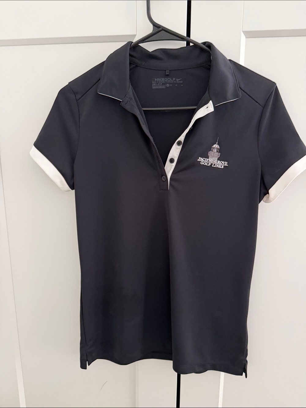 Nike Women's Black Polo with White Trim Pacific Grove golf links